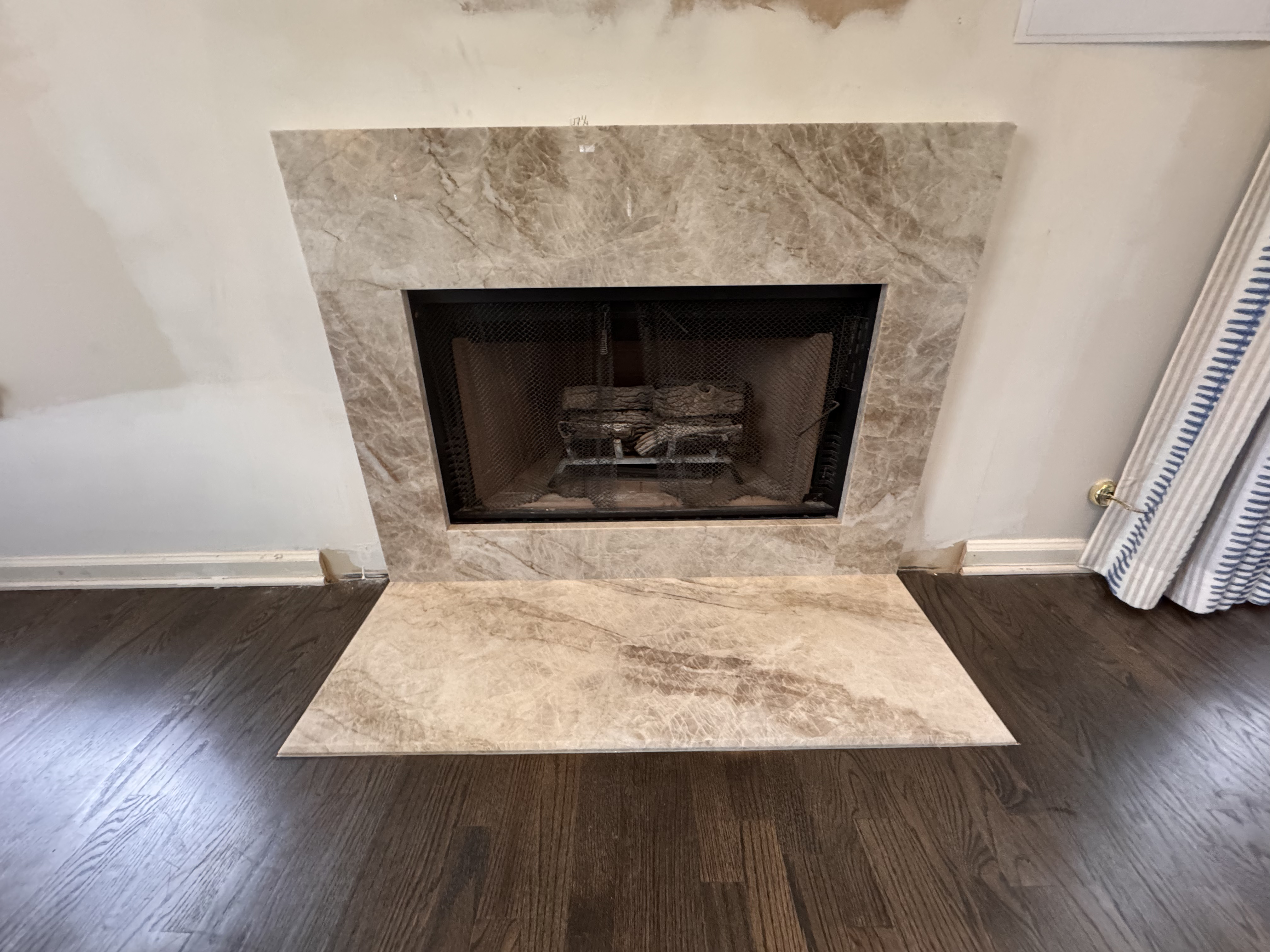 Natural quartzite fireplace surround and hearth